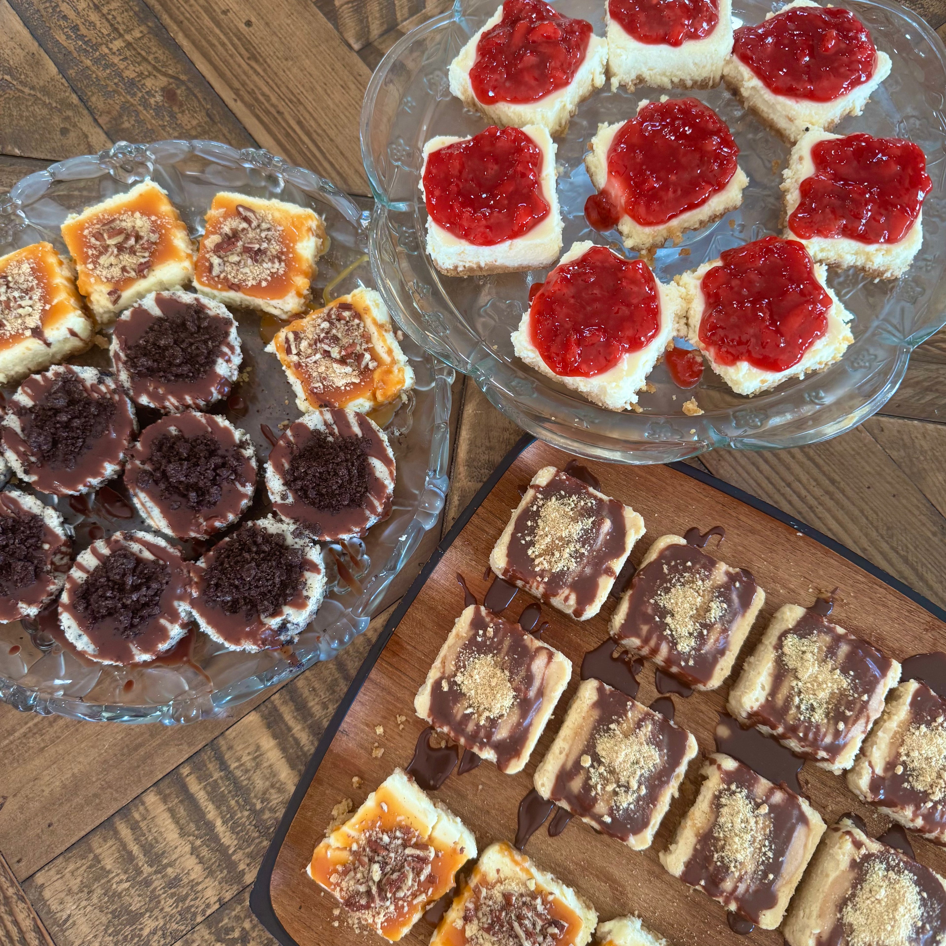 Full Mini Cheesecake Display with Strawberry, Turtle, Oreo, and Peanut Butter.